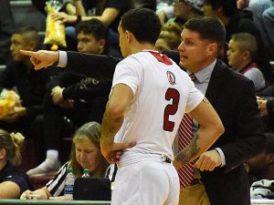 Incarnate Word coach Carson Cunningham gives directions to freshman guard Jordan Caruso in a 90-64 loss to Northern Colorado on Wednesday, Nov. 21, 2018.