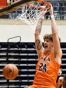 UTSA center Jacob Germany throws down a dunk with 2:18 left to give UTSA a 69-65 lead in a 77-69 victory over North Texas on Saturday, Jan. 9, 2021 at the Convocation Center. - photo by Joe Alexander