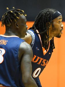 Dhieu Deing and Cedrick Alley Jr. look to the Roadrunners' coaches for instructions with 2.0 seconds left in the game. UTSA came from behind to beat IUPUI 60-57 on Wednesday at the Convocation Center. - photo by Joe Alexander