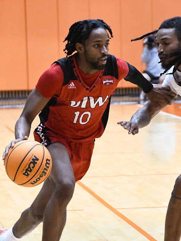 Jonathan Cisse scored 10 points including a basket with five seconds left to tie the game as UIW beat Grambling State 63-61 in men's basketball on Sunday, Nov. 27, 2022, at the UTSA Convocation Center. - Photo by Joe Alexander