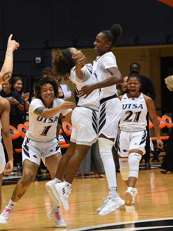 Madison Cockrell and Jordyn Jenkins celebrate after Cockrell hit a long shot to end the first half. The UTSA women's basketball team lost to Louisiana Tech 62-57 in the Roadrunners' Conference USA opener on Thursday, Dec. 29, 2022, at the Convocation Center. - Photo by Joe Alexander