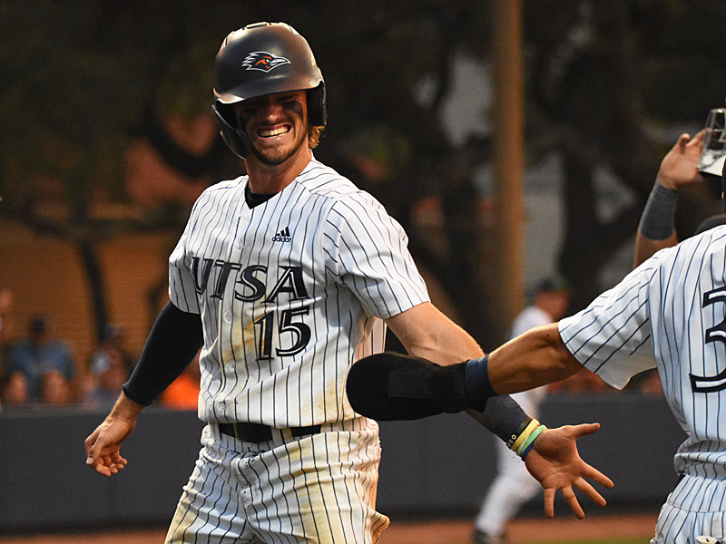 Caleb Hill celebrates with Antonio Valdez (3) after they both scored in the seventh inning. UTSA scored four runs in the seventh inning to rally past Rice 9-7 in Conference USA baseball on Friday, May 5, 2023, at Roadrunner Field. - Photo by Joe Alexander