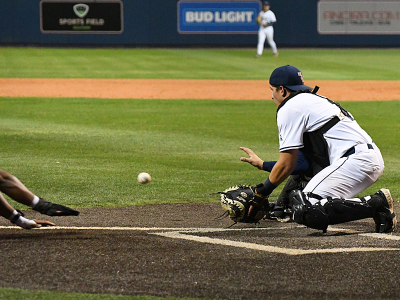 UTSA catcher Jacob Silva tags out A&M-Corpus Christi's Isaiah Afework off a throw from left fielder Drew Detlefsen in the top of the eighth inning. UTSA beat A&M-Corpus Christi 3-1 on Tuesday, March 24, 2026, in non-conference baseball at Roadrunner Field. - Photo by Joe Alexander