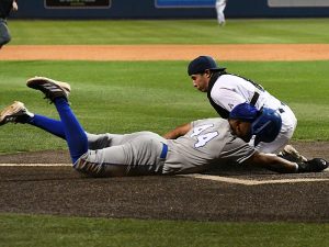 UTSA catcher Jacob Silva tags out A&M-Corpus Christi's Isaiah Afework off a throw from left fielder Drew Detlefsen in the top of the eighth inning. - Photo by Joe Alexander