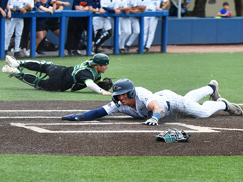 Caden Miller scores on Drew Detlefsen's three-run double in the bottom of the second inning. UTSA beat South Florida 11-3 in American Conference baseball on Friday, April 10, 2026, at Roadrunner Field. - Photo by Joe Alexander